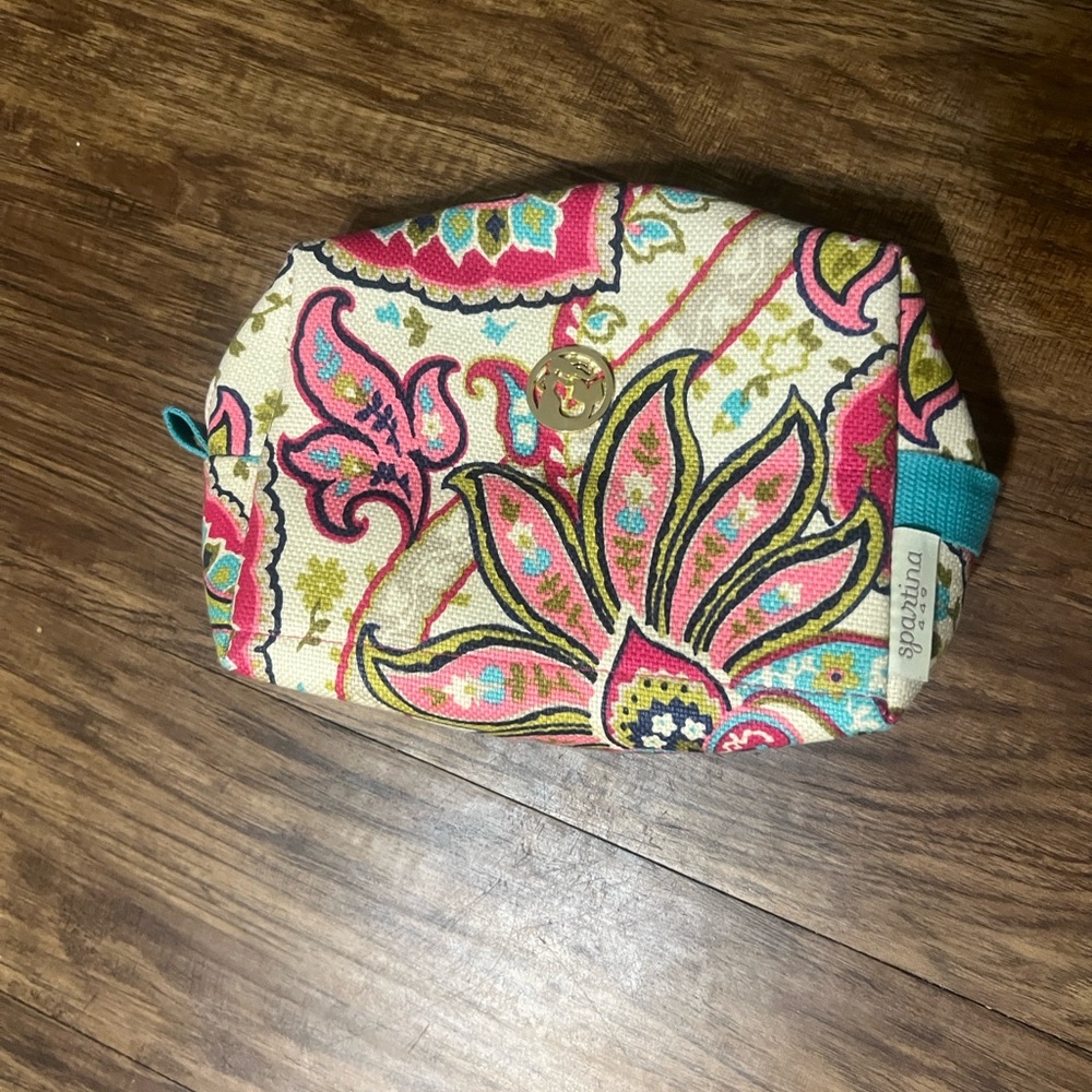 Salt Meadow. Pink Floral Cosmetic Pouch In Bright Colors and Zippered Top.